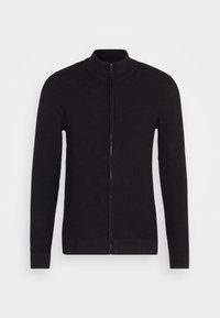 Pull noir à fermeture éclair avec col montant, fabriqué en tissu tricoté côtelé. Comprend des manches longues et un ourlet droit, design minimaliste.