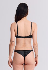 Erlich Textil FLUID - String - schwarz