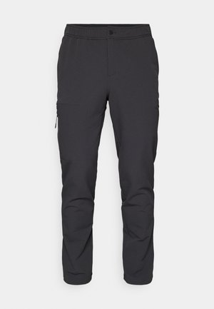 Pantalons noirs fuselés avec une taille élastique, poche latérale zippée et tissu lisse et léger. Idéal pour le sportswear.