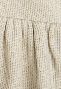 Chicco Stickad klänning - beige