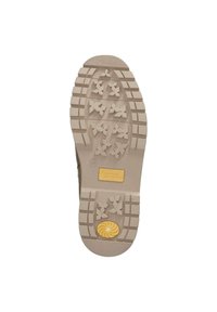 Suola di stivale in gomma beige con scanalature orizzontali e battistrada a forma di stella. Presenta un accento circolare giallo e il nome del produttore al centro.