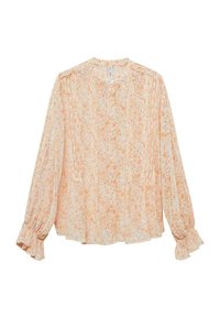 Blouse à motifs floraux en orange pâle et crème, avec manches longues et poignets à volants. Tissu léger et texturé avec des plis verticaux.