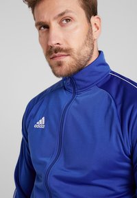 adidas Performance CORE ELEVEN FOOTBALL TRACKSUIT JACKET - Chaqueta de entrenamiento - blue/white