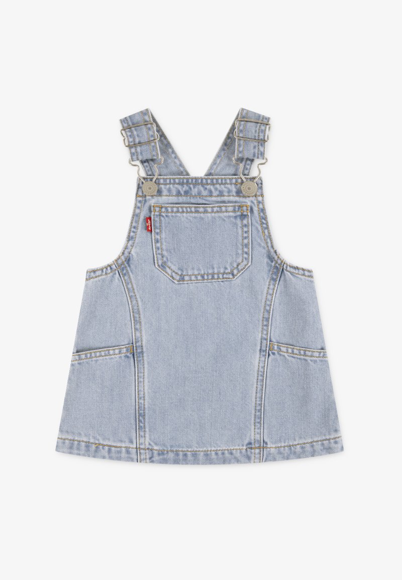 Φόρεμα ολόσωμο από ανοιχτό μπλε τζιν με ρυθμιζόμενες τιράντες, μπροστινή τσέπη, πλαϊνές τσέπες και ραφές σε αντίθετο χρώμα. Λείο υφή και κλασικός σχεδιασμός.