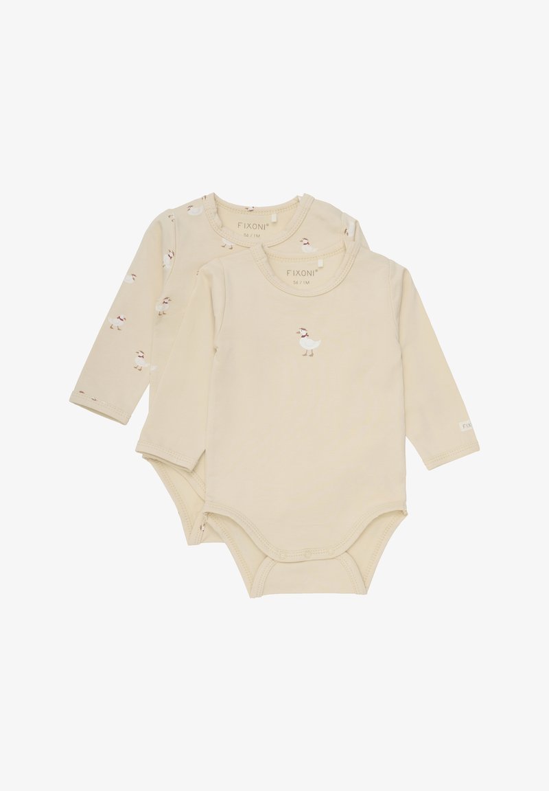 Długi rękaw bodysuit w jasnym beżowym kolorze z małymi nadrukami kaczek. Posiada zapięcia na zatrzaski na dole oraz miękkie ściągacze przy dekolcie.