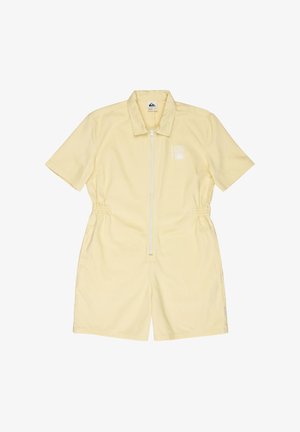 Világos sárga, rövid ujjú overál elülső cipzárral, gallérral, rugalmas derékkal és kis fehér nap- és hullámmintával a bal mellkason.