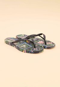 Black flip-flops with a floral pattern featuring green, pink, and blue accents. Textured straps and a flat sole design.