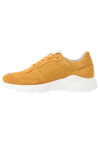 Suede sneakers in mustard yellow with a smooth finish, perforated detailing, white rubber sole, round toe, and lace-up closure.