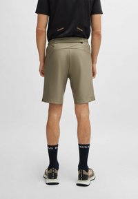 BOSS HECON ACTIVE - Short de sport - light green four