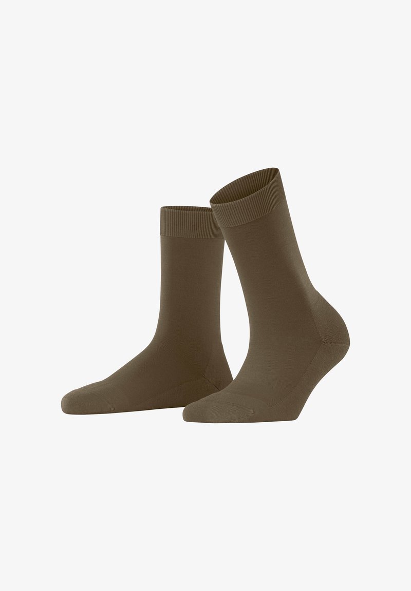 Braune Crew-Socken mit gerippten Bündchen, aus einem glatten, dehnbaren Material gefertigt. Mit nahtlosem Zehenbereich und verstärktem Fersenbereich für Langlebigkeit.