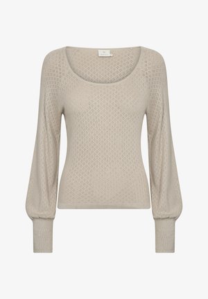 Valgebeezist kootud sviiter, millel on avatud kaelus, pikad puffvarrukad ja soonikkoes mansetid. Omab tekstuuri loovavat avatud töömustrit.