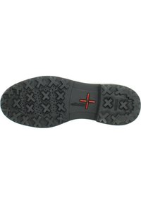 Suela de zapato de goma negra con textura y diseño de huellas en forma de X. Incluye un acento rojo y agujeros de ventilación en el costado.