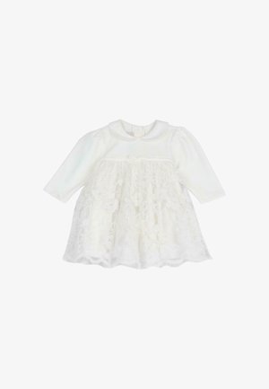 Weißes Baby-Kleid mit langen Ärmeln, Spitzenblumenüberrock und kleinem Schleifendetail unter dem Kragen.