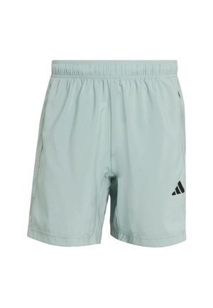Light green athletic shorts made of smooth fabric, featuring an elastic waistband, side pockets, and black logo accents.