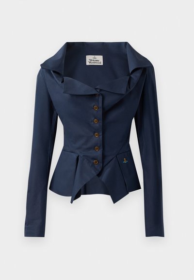 Navy jacket with an oversized collar, long sleeves, front buttons, peplum hem, and small embroidered detail near the waist. Textured fabric.