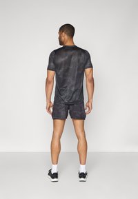 New Balance PRINTED SHORT - Sport rövidnadrágok - castlerock