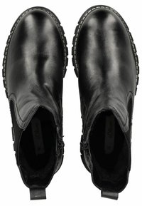 Botas de cuero negras hasta el tobillo con paneles elásticos laterales, punta redonda y suelas de goma con patrón. Detalle de cremallera en el lado interior.