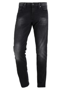Vaqueros de denim negro con un ajuste slim, que cuentan con un diseño clásico de cinco bolsillos. Textura ligeramente descolorida en la parte delantera, con botón y remaches de metal.