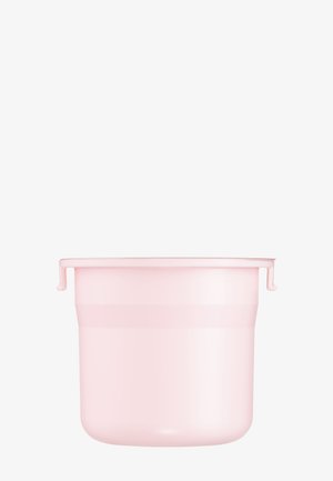 Petit récipient rond pliable en silicone rose avec deux crochets sur le bord, sur un fond blanc uni.