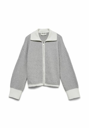 Cardigan gris en maille avec un col et des poignets blancs, doté d'une fermeture éclair et d'un motif texturé sur l'ensemble. Coupe courte et ample.
