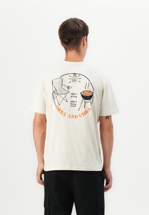 YUKIS - Print T-shirt - beige dimity