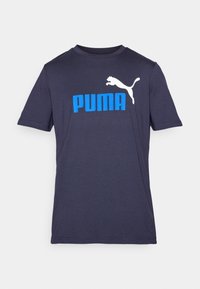 Navy blue cotton T-shirt with short sleeves, featuring a large white leaping puma logo and bold blue "PUMA" text on the front.
