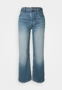 Light blue denim jeans with a wide-leg design, featuring a faded gradient effect, five pockets, and a button closure at the waistband.