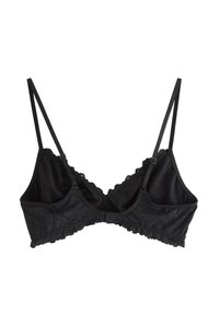 Mustat liivit, joissa on kukkakuvioinen pitsireuna, ohuet säädettävät olkaimet ja hakasulfistus takana. Pehmeä kangas, jossa on sujuva rakenne.