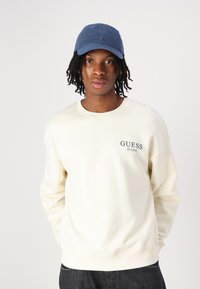 Guess Jeans BACK MACRO LOGO - Felpa - creme