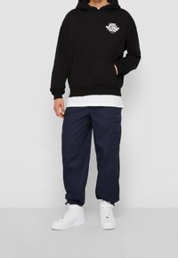 Lost Youth Jersey con capucha - black
