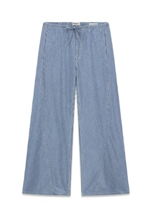 Pantalon large à rayures verticales bleues et blanches avec une taille élastique et un cordon de serrage noué à l'avant.