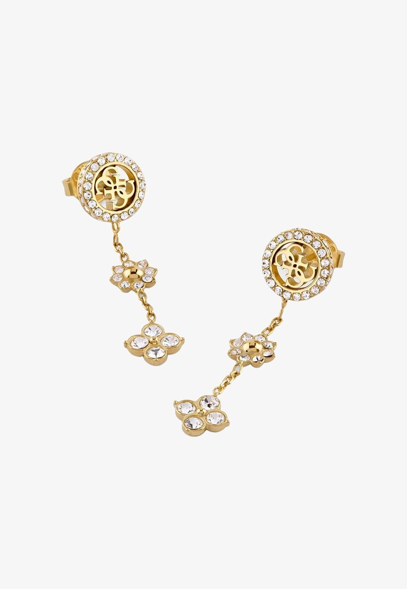 Złocone kolczyki wiszące z okrągłymi górnymi częściami wysadzanymi kryształami oraz dwoma połączonymi zawieszkami w kształcie kwiatów, każda ozdobiona przezroczystymi kryształami.