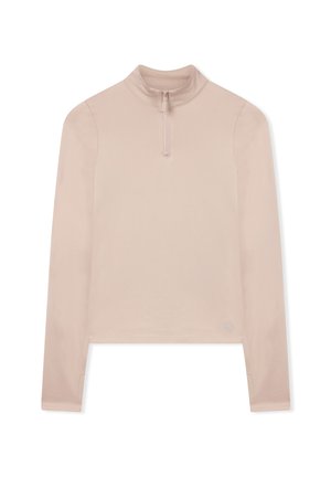 Beżowy crop top z długim rękawem, z wysokim kołnierzem i półzamykiem z przodu, wykonany z gładkiego materiału.