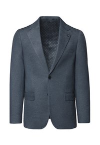 Granatowa marynarka z fakturowanej tkaniny, z klapami, dwiema przednimi kieszeniami i podszewką w kropki. Zapięcie na jeden guzik.