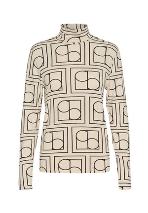 Haut à col roulé à manches longues couleur crème, orné d'un motif géométrique noir de carrés et cercles superposés, fabriqué en tissu doux et extensible.