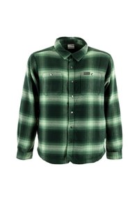 Chemise en flanelle à carreaux verts avec deux poches poitrine, col à boutons, et accents de boutons en argent. Texture douce avec des nuances claires et foncées alternées.