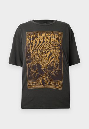Black cotton t-shirt featuring a gold graphic print of skeletons and text, with a relaxed fit and short sleeves.