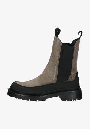 Suede ankle boot in light brown with black elastic side panels. Thick rubber sole with a rugged tread for grip. Pull tab at the heel.