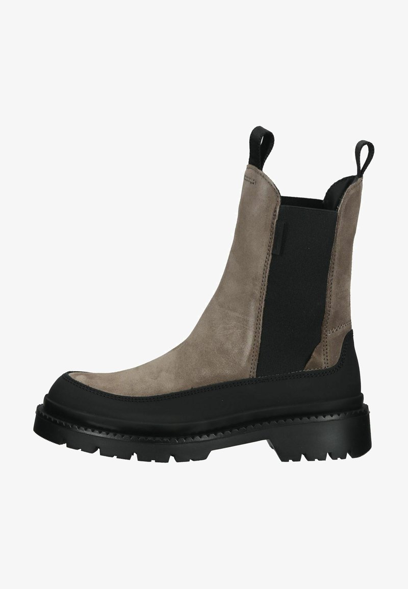 Suede ankle boot in light brown with black elastic side panels. Thick rubber sole with a rugged tread for grip. Pull tab at the heel.