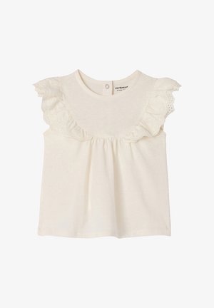 Cream-colored sleeveless baby top with eyelet ruffle detailing around the neckline and a snap button closure at the back.