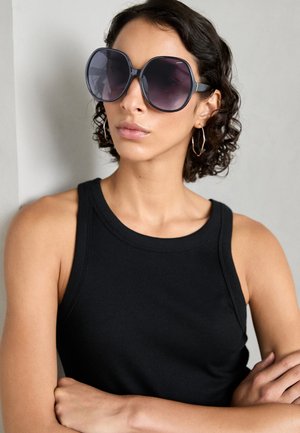 Aurinkolasit - black