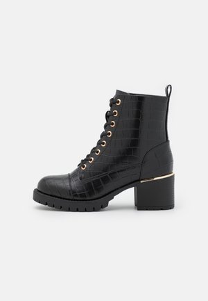 Bottines à lacets - black