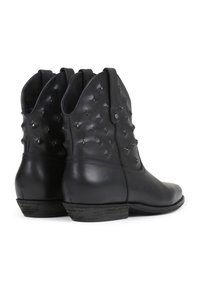 Black leather ankle boots with studded detailing, textured upper, low heel, and pull tabs on sides for easy wear.
