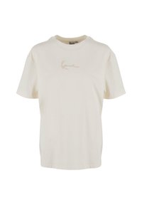 Cremefarvet bomuld t-shirt med korte ærmer, rund halsudskæring og en diskret beige broderet logo på brystet.