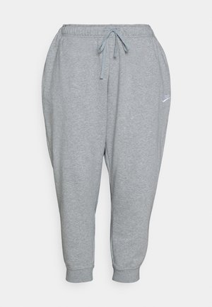 Grijze joggingbroek van zacht materiaal, met een elastische tailleband en verstelbaar trekkoord, en taps toelopende boorden. Klein logo op de zijkant.