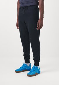 ICANIWILL ACTIVITY PANTS MEN - Treniņtērpa apakšdaļas - black