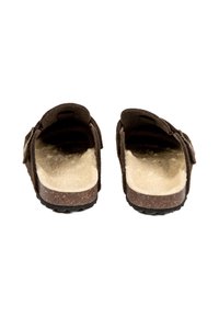 Sabots en feutre marron avec intérieur doublé de fourrure douce, semelle en liège et sangle latérale réglable. Semelle plate pour le confort et un design décontracté.