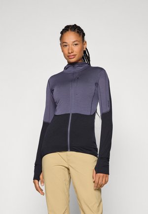 Figurbetontes Zip-Up-Jackett mit einem Verlaufdesign in Lila und Schwarz, langen Ärmeln mit Daumenlöchern und strukturierten Stoffdetails.