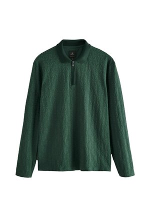 Suéter de manga larga verde con una superficie texturizada y patrón, que presenta un cuello con cremallera y un diseño de cuello clásico.