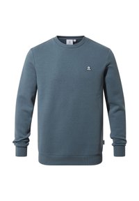 Long-sleeve crewneck sweatshirt in muted blue with ribbed cuffs and hem, featuring a small logo patch on the left chest.